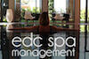       EDC SPA MANAGEMENT